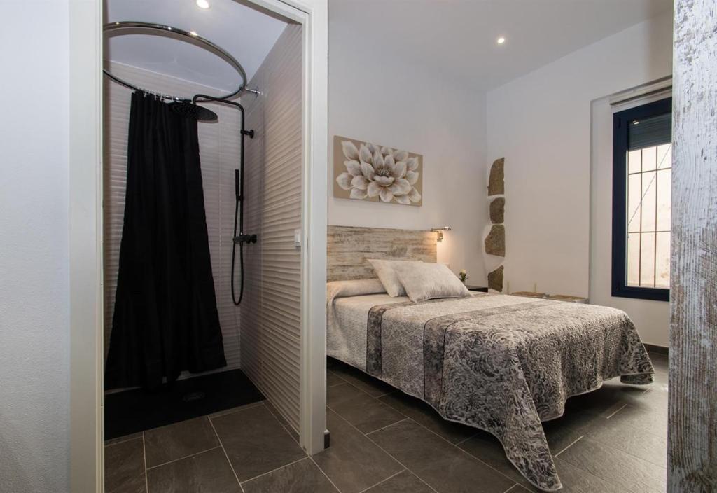 Postel nebo postele na pokoji v ubytování Petit Loft
