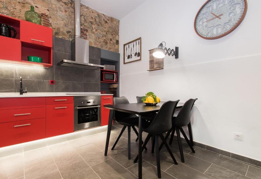 Kuchyň nebo kuchyňský kout v ubytování Petit Loft