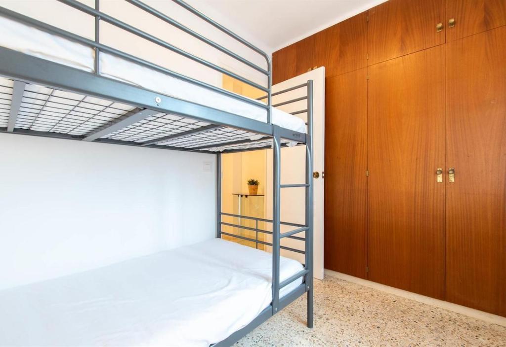 Postel nebo postele na pokoji v ubytování Moli Apartment Beach