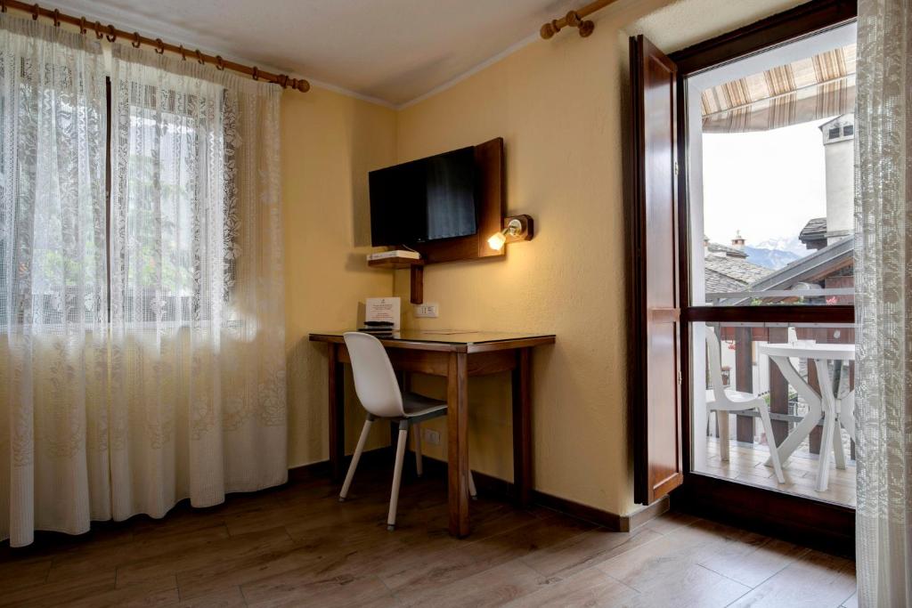 TV a/nebo společenská místnost v ubytování Hotel Cecchin