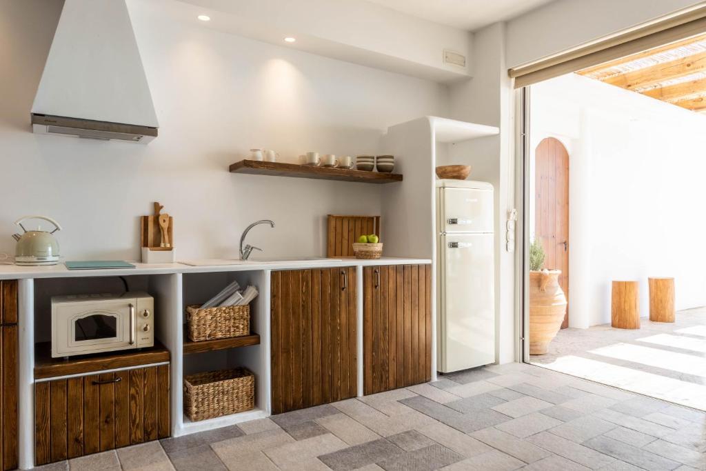 Kuchyň nebo kuchyňský kout v ubytování Euphoria Suites and Spa