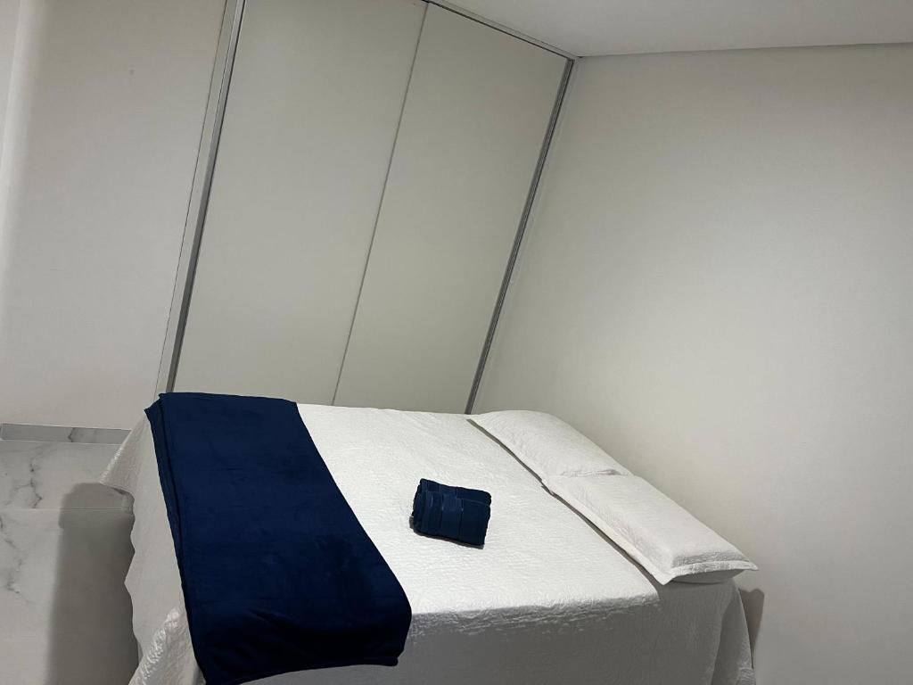 En eller flere senge i et værelse på No coração da Jatiúca