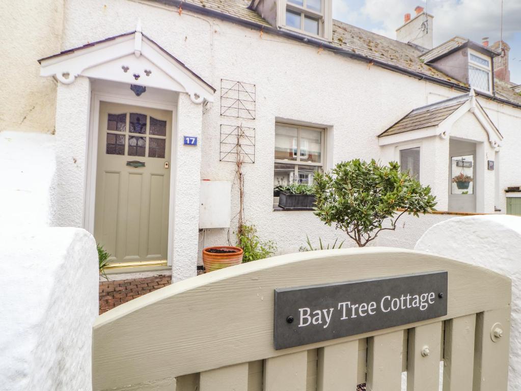 Signal du cottage abey devant une maison dans l'établissement Bay Tree Cottage, à Beaumaris
