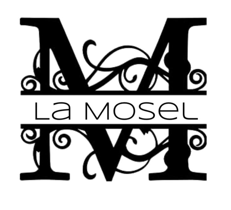 a black and white sign that reads la mossy iv at Moselblick Winningen Traumwohnung im „La Mosel“ in Winningen