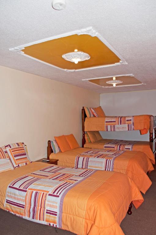 Postel nebo postele na pokoji v ubytování Hotel Residencial El Viajero
