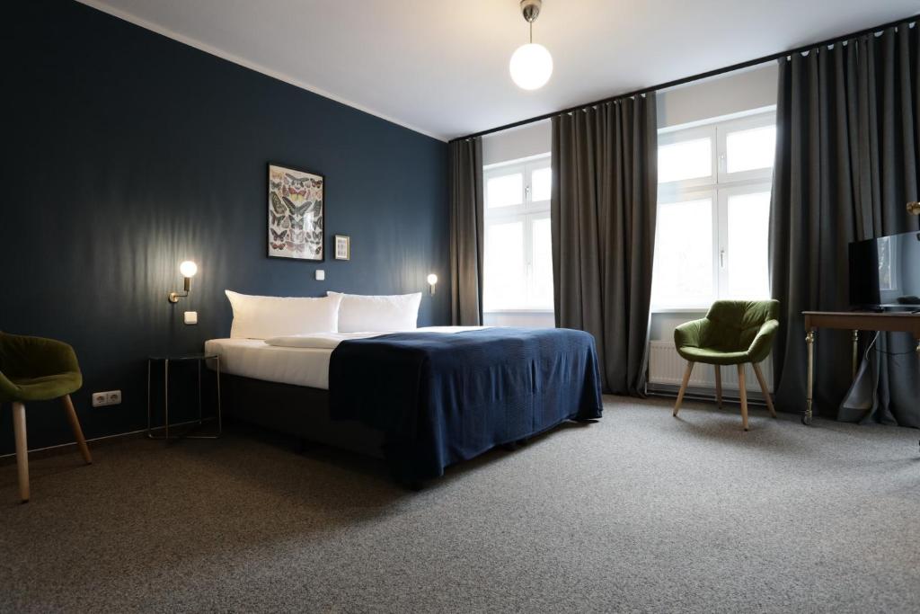 Postel nebo postele na pokoji v ubytování Lieblingsplatz Bohlendorf Rügen