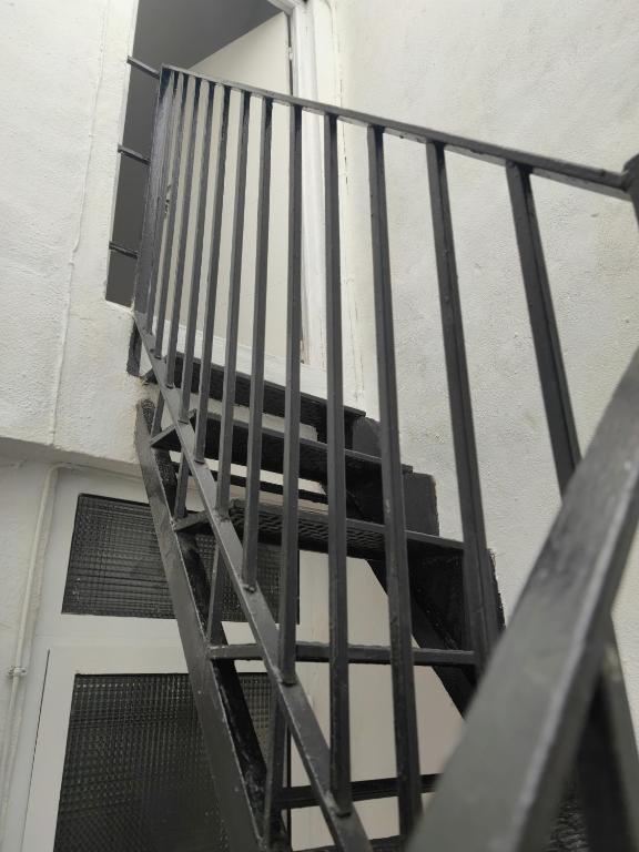 Łóżko lub łóżka piętrowe w pokoju w obiekcie Encantadora Casa con Patio
