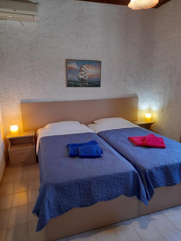 Postel nebo postele na pokoji v ubytování Coral Villas