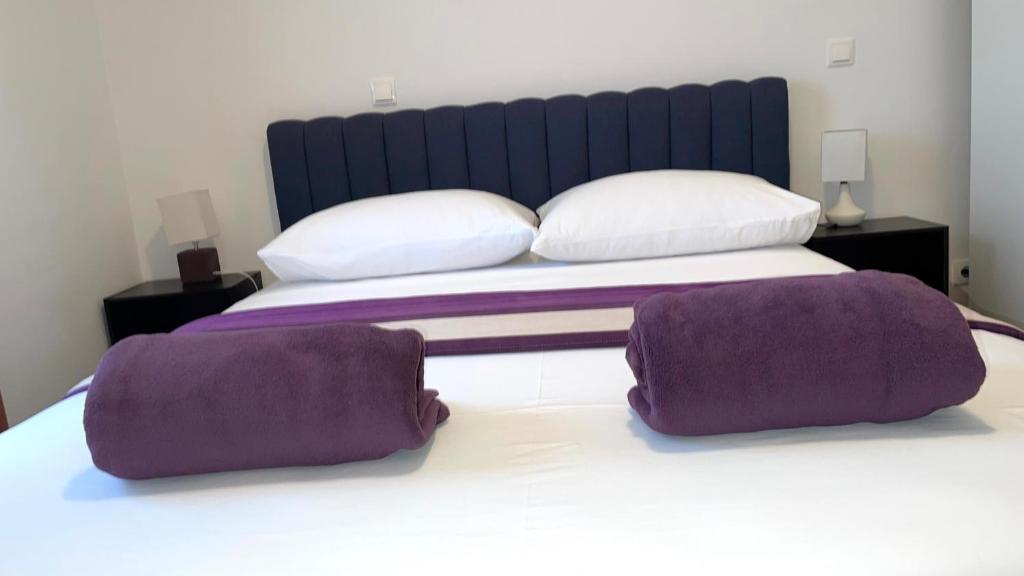 Postel nebo postele na pokoji v ubytování Villa Evita Apartments