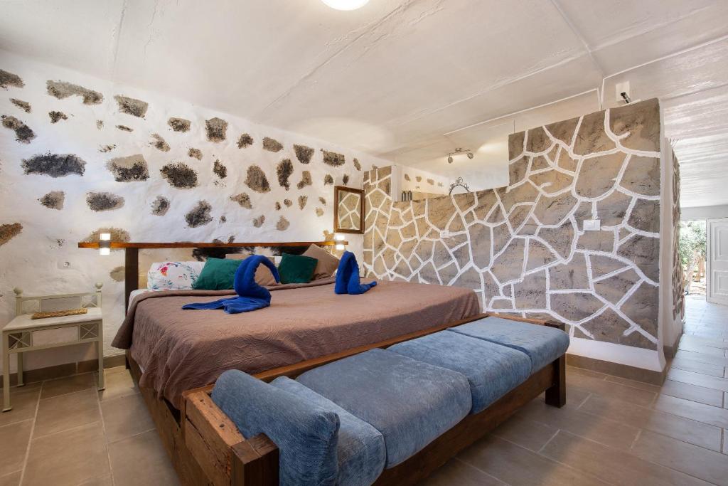 מיטה או מיטות בחדר ב-Esencia Eco-rústico