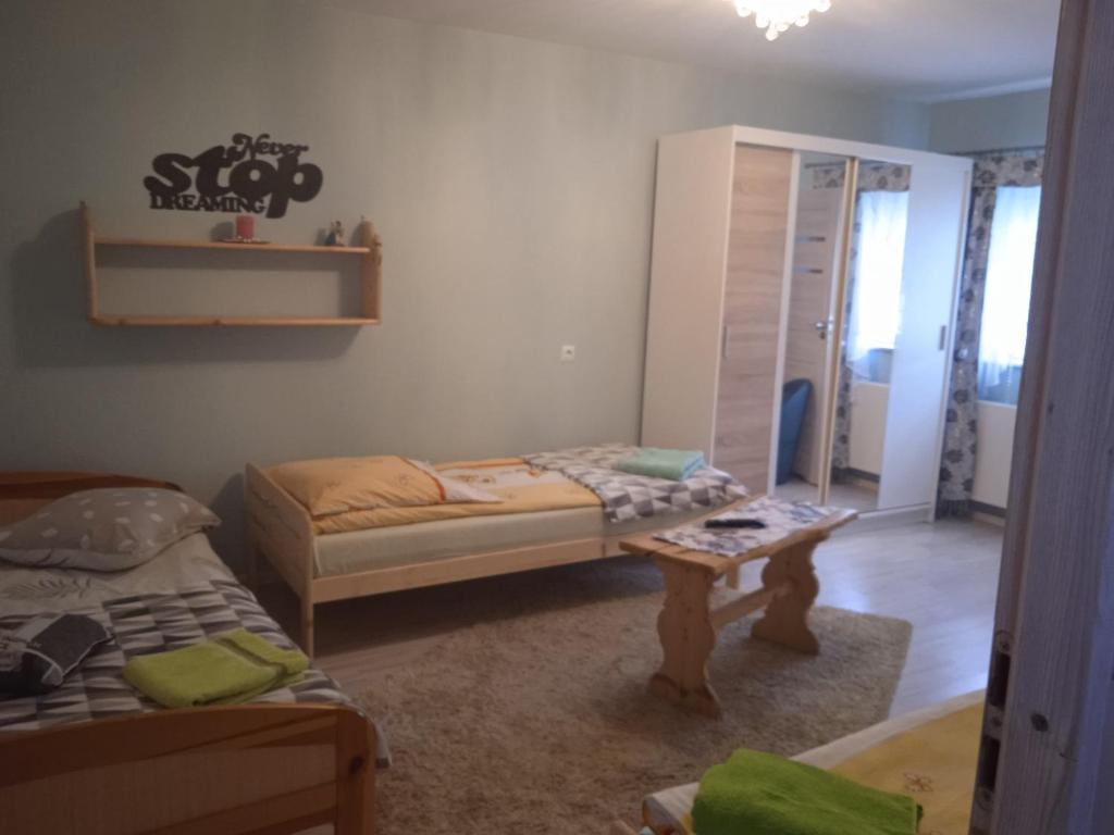 Posteľ alebo postele v izbe v ubytovaní AMICO