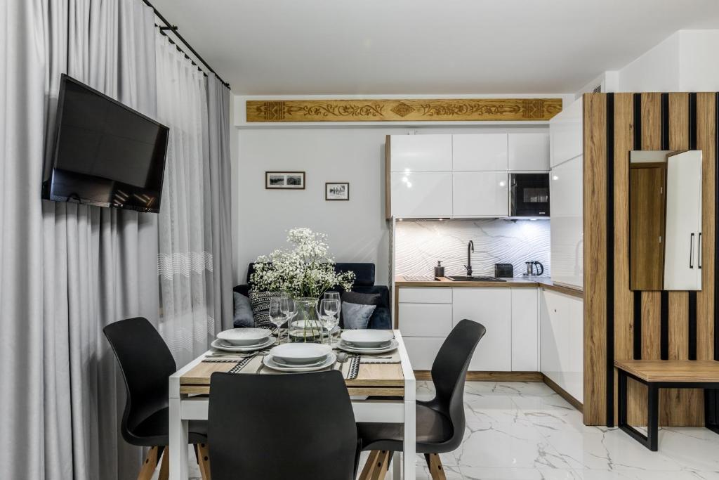 Kuchyňa alebo kuchynka v ubytovaní Apartament Modrzejewska