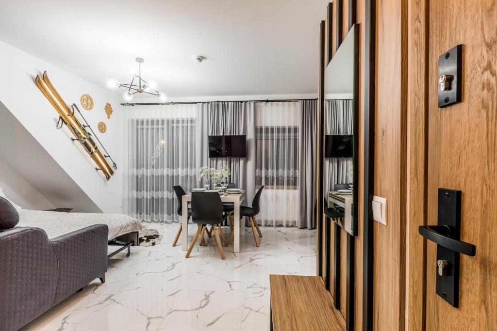 Posedenie v ubytovaní Apartament Modrzejewska