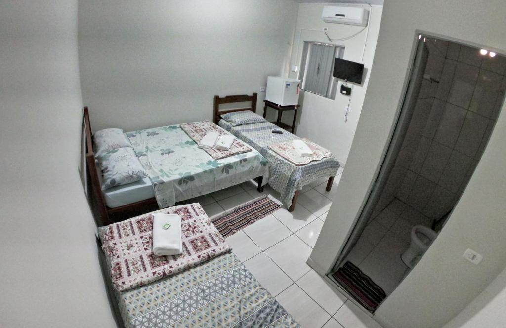 Postel nebo postele na pokoji v ubytování Pousada Vidal