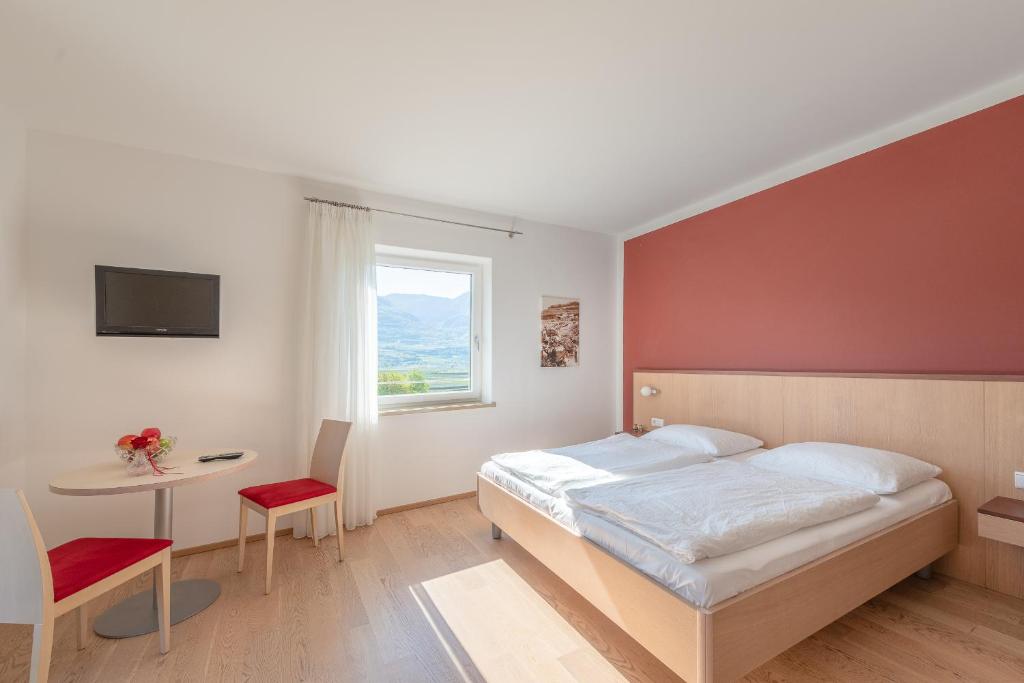 Postel nebo postele na pokoji v ubytování Sandhof Ferienwohnungen
