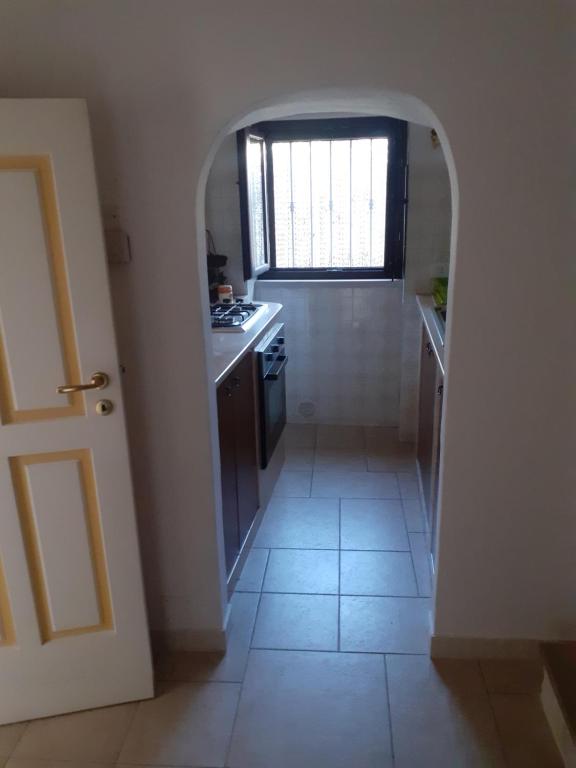 A kitchen or kitchenette at Trulli nonna Grazia-Aurora