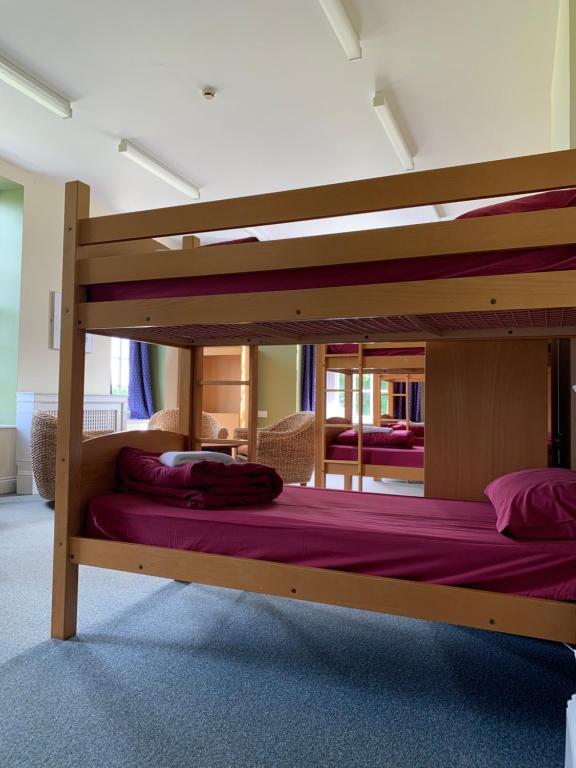 Postel nebo postele na pokoji v ubytování Jersey Accommodation and Activity Centre