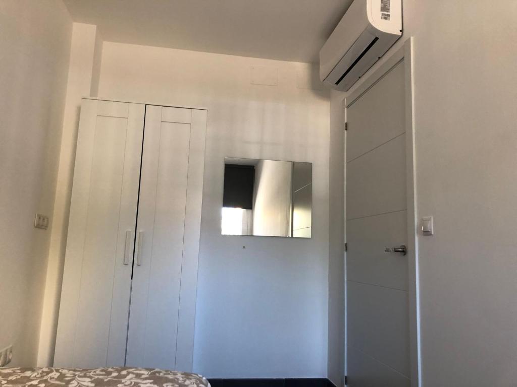 A bed or beds in a room at La Casita