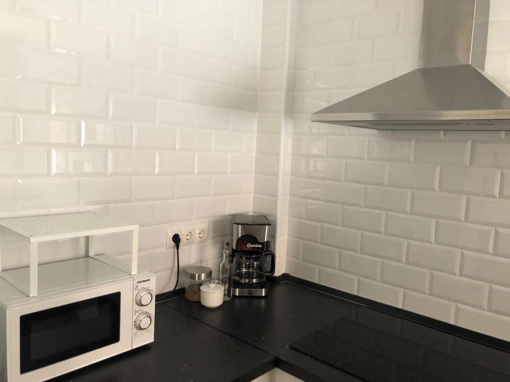 A kitchen or kitchenette at La Casita