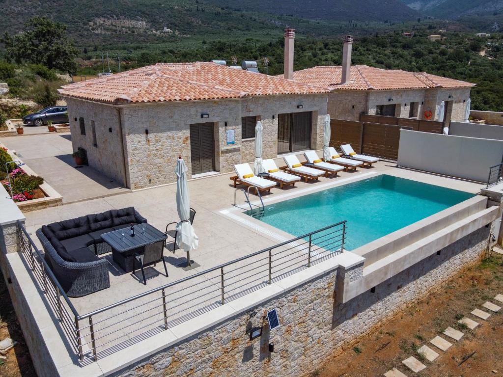 Bazén v ubytovaní Manazil Mani - Luxury Villas alebo v jeho blízkosti