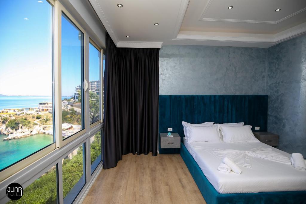 Postel nebo postele na pokoji v ubytování Skyhill Boutique Hotel