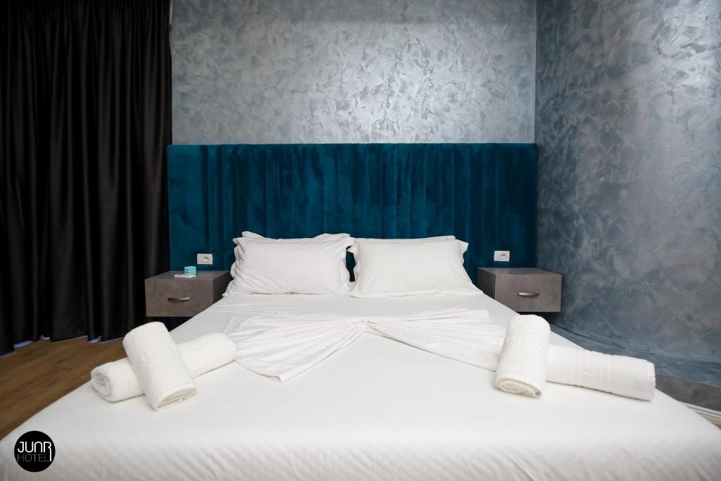 Postel nebo postele na pokoji v ubytování Skyhill Boutique Hotel