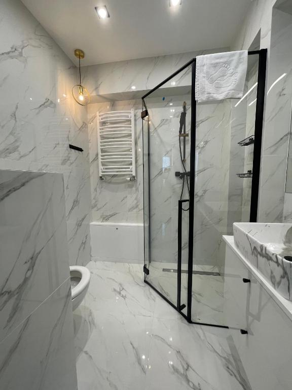 Kúpeľňa v ubytovaní Apartament Planeta Mielno 114 Premium