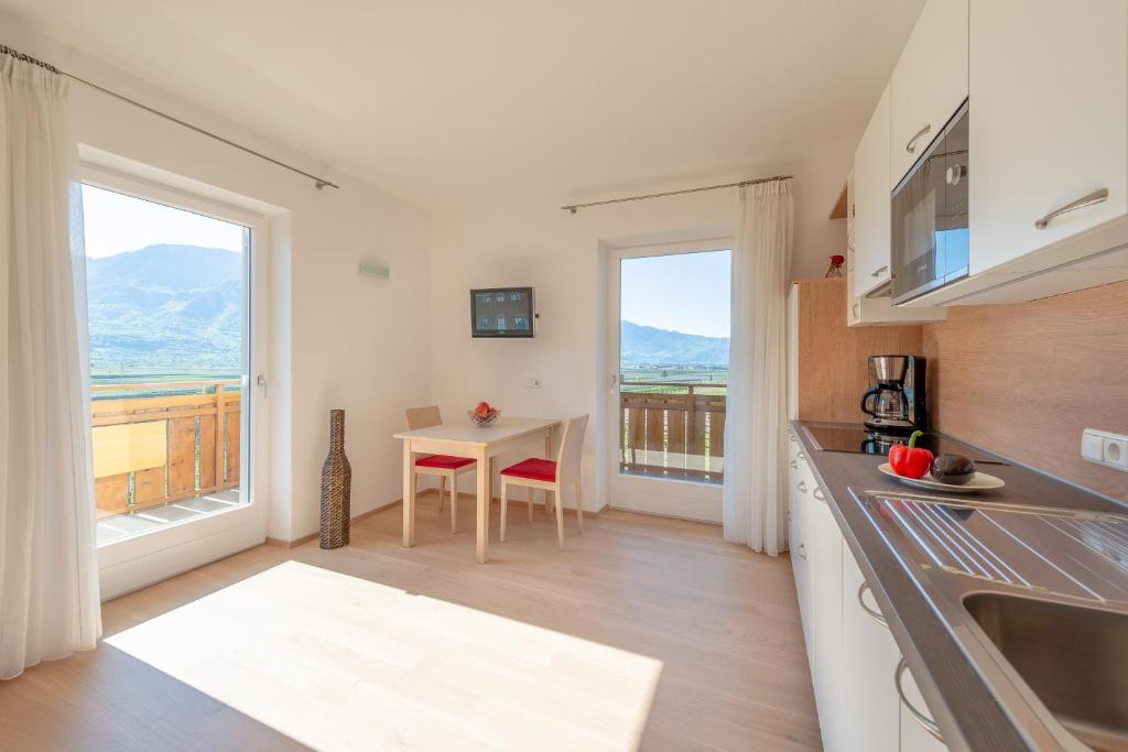 Kuchyň nebo kuchyňský kout v ubytování Sandhof Ferienwohnungen