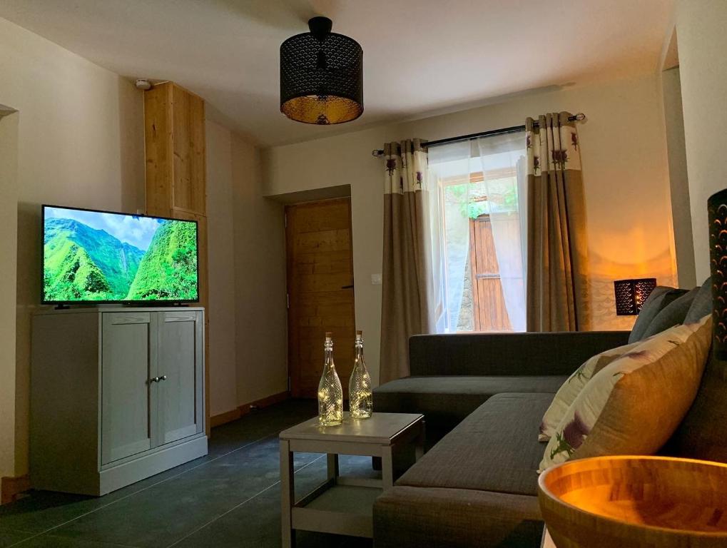TV a/nebo společenská místnost v ubytování le Studio