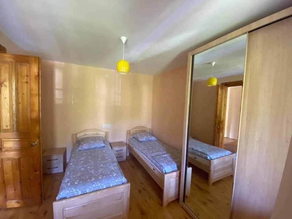 Postel nebo postele na pokoji v ubytování guesthouse MUKHA