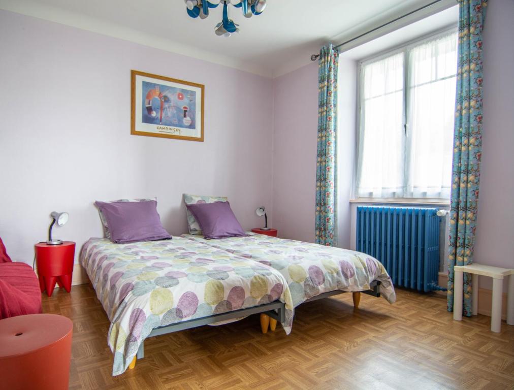 Postel nebo postele na pokoji v ubytování Gîte Le Noisetier