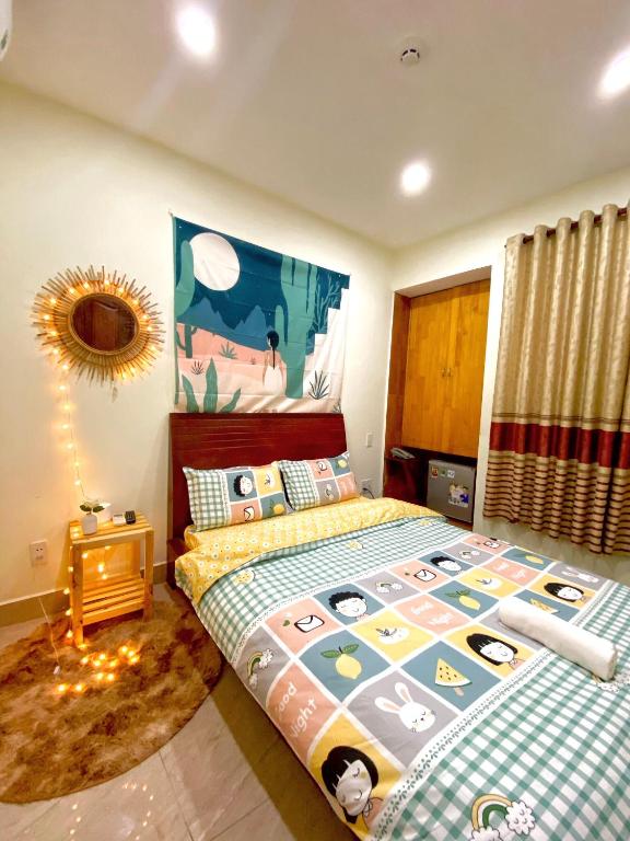 Postel nebo postele na pokoji v ubytování Hệ thống MylaHome - Chi nhánh Ks Kim Châu
