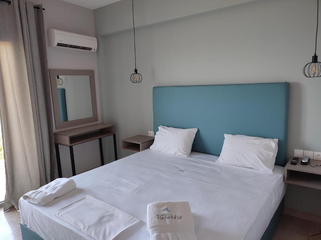 Postel nebo postele na pokoji v ubytování Hotel Paraktio