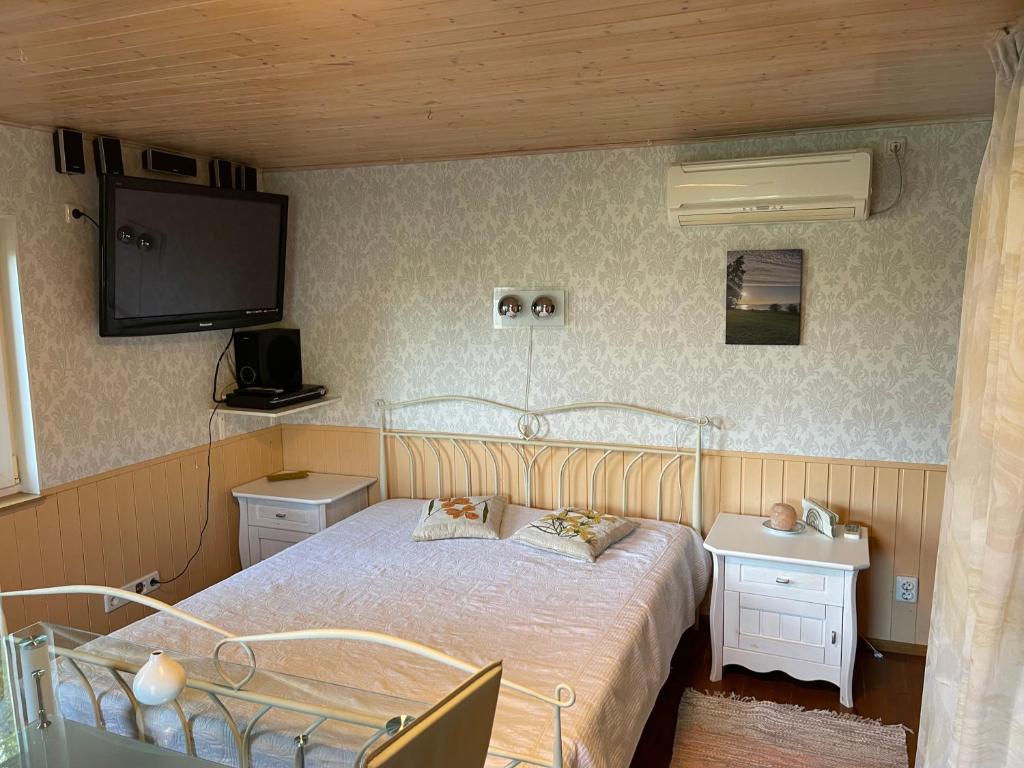 Postel nebo postele na pokoji v ubytování puhkemajake