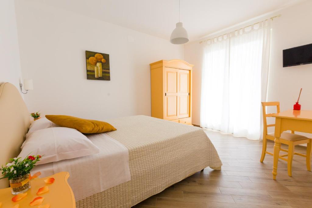 Postel nebo postele na pokoji v ubytování B&B Toma'