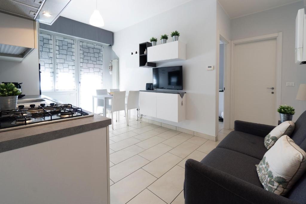 A kitchen or kitchenette at GetTheKey Pasubio Apartment