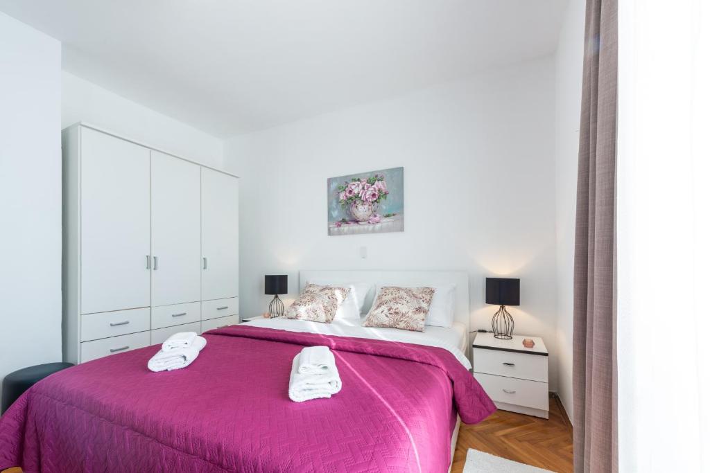 Posteľ alebo postele v izbe v ubytovaní Apartment Sunset free parking