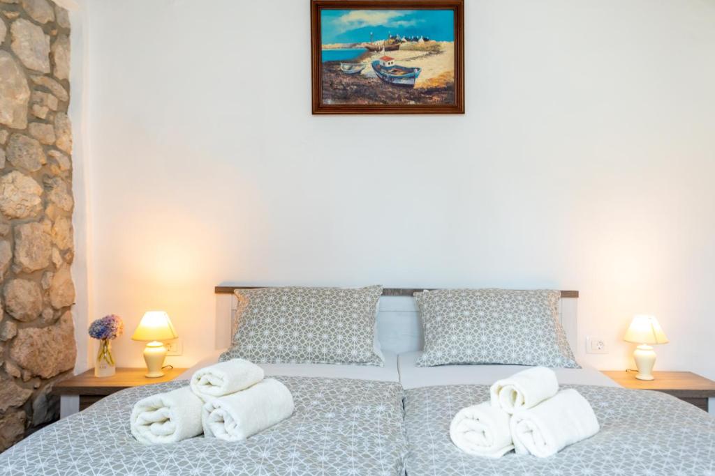 Postel nebo postele na pokoji v ubytování Holiday house PAVOVCI