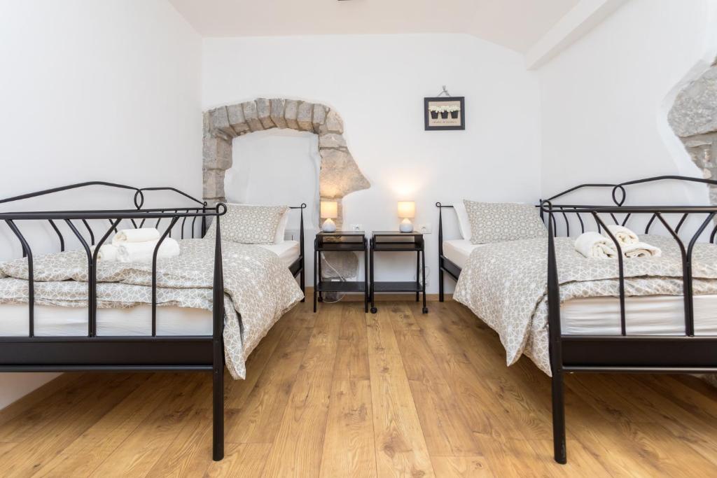 Postel nebo postele na pokoji v ubytování Holiday house PAVOVCI