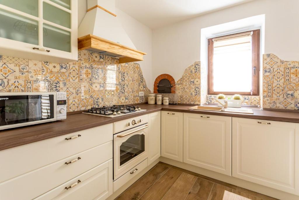 Kuchyň nebo kuchyňský kout v ubytování Holiday house PAVOVCI