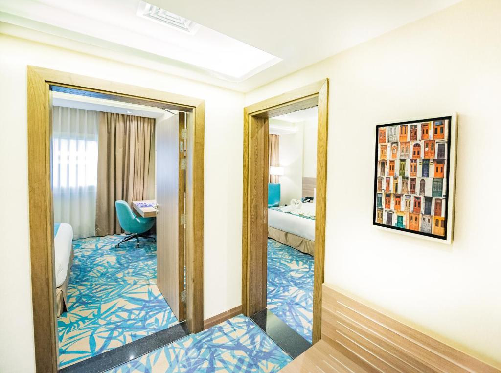 MENA Plaza Hotel Albarsha At The Mall - Resim 35