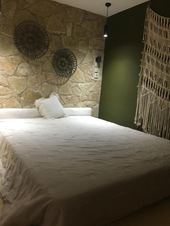 Postel nebo postele na pokoji v ubytování Avas studios