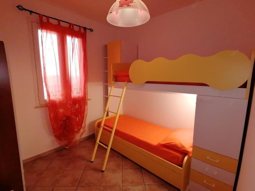Postel nebo postele na pokoji v ubytování Case Vacanze Vista Mare