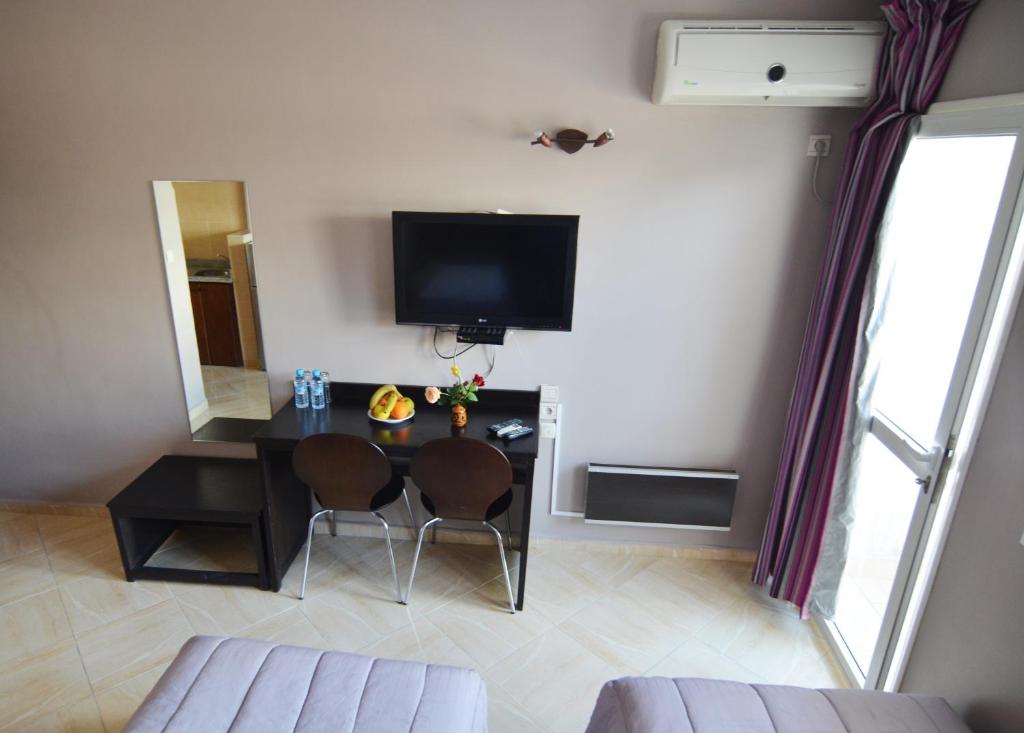 TV a/nebo společenská místnost v ubytování Résidence Hotelière Fleurie