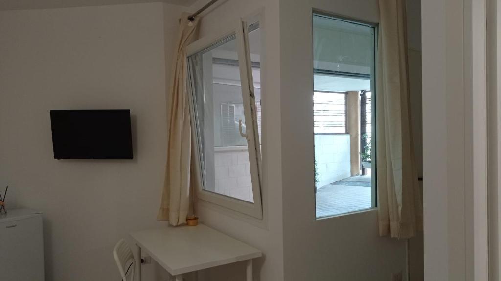 Telewizja i/lub zestaw kina domowego w obiekcie Rosa's Rooms