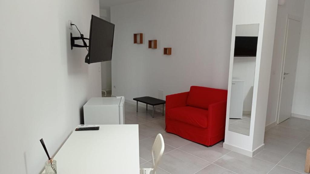 Telewizja i/lub zestaw kina domowego w obiekcie Rosa's Rooms