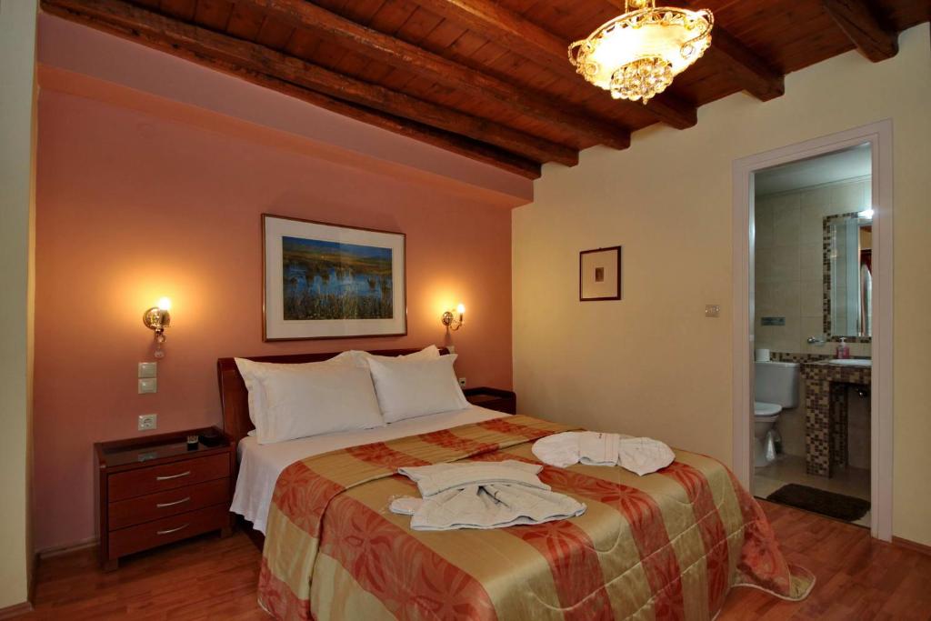 Postel nebo postele na pokoji v ubytování Guesthouse Stemnitsa