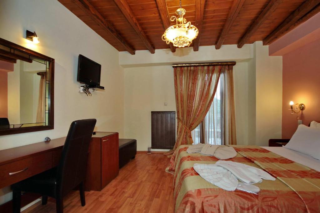 Postel nebo postele na pokoji v ubytování Guesthouse Stemnitsa