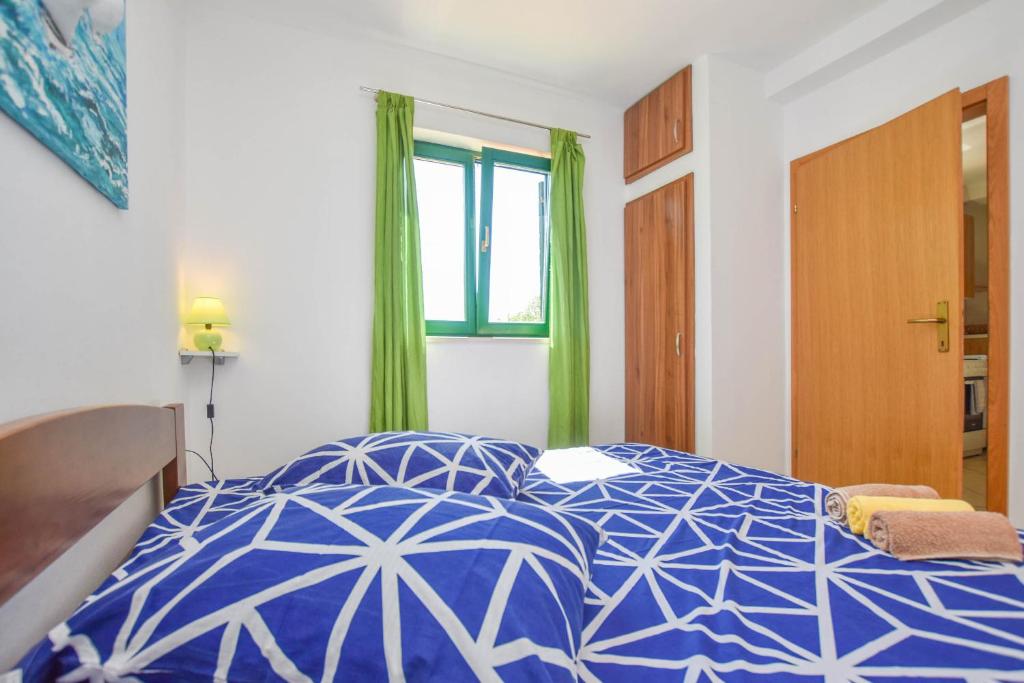 Posteľ alebo postele v izbe v ubytovaní House Oliver