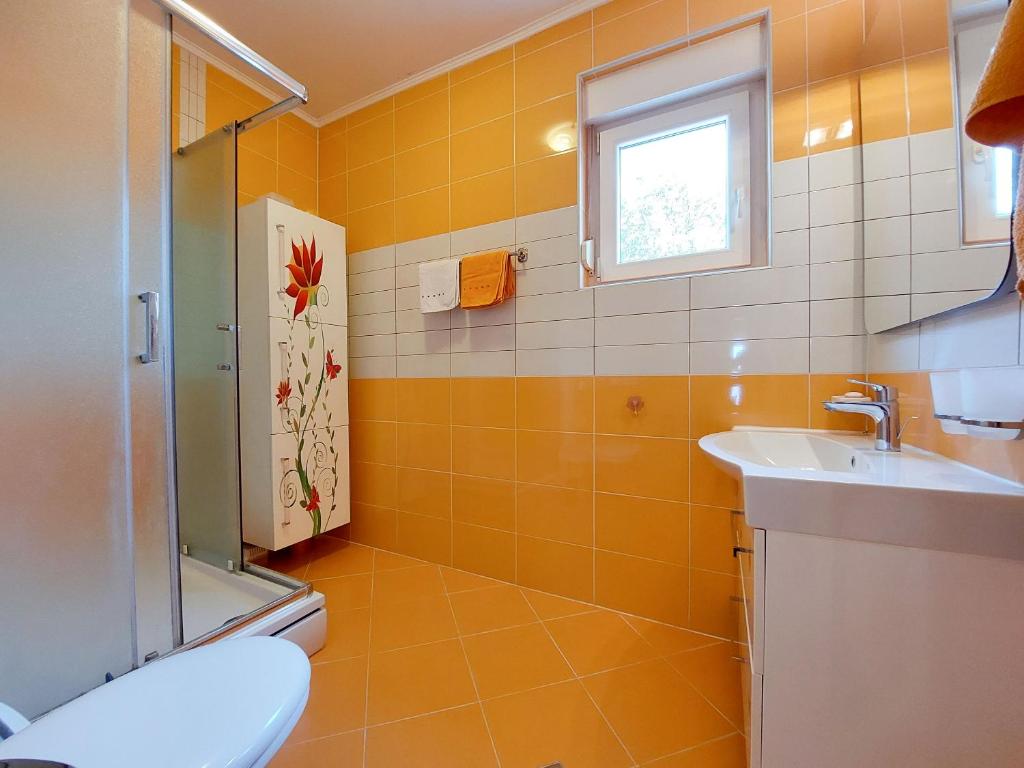 Koupelna v ubytování Apartments Faran